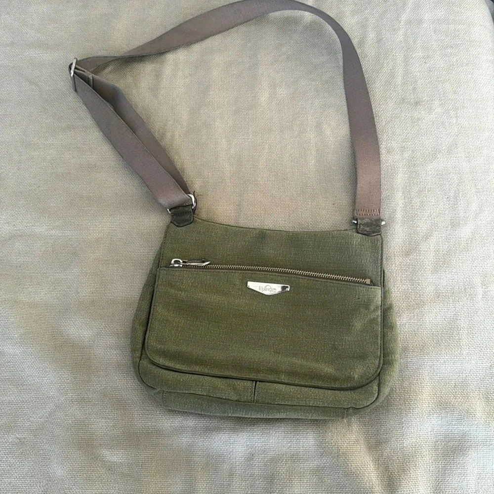 Kipling moss green with colbalt blue lining crossbody bag